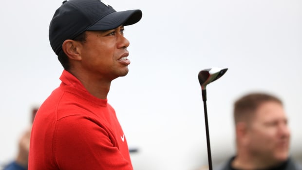 Tiger Woods shots a shoot on the final day of the Farmers Insurance Open.