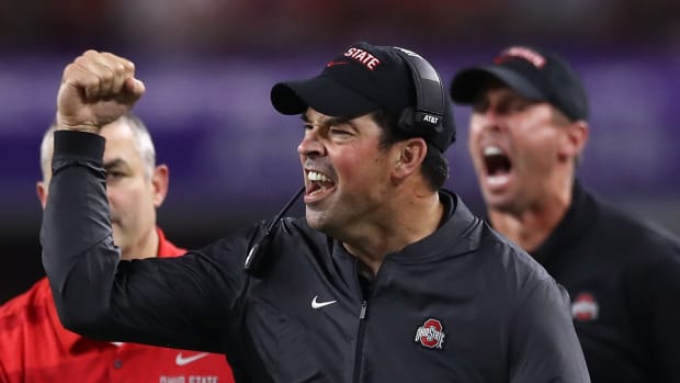 Ohio State football coach Ryan Day celebrating during a football game.