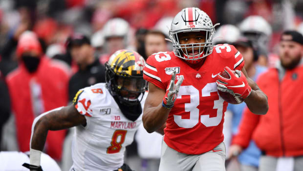 Master Teague III runs for Ohio State against Maryland.