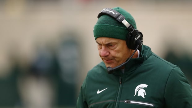 A closeup of Mark Dantonio during a Michigan State football game. He could be on the hot seat after another loss.