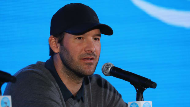 Tony Romo speaks at a press conference.