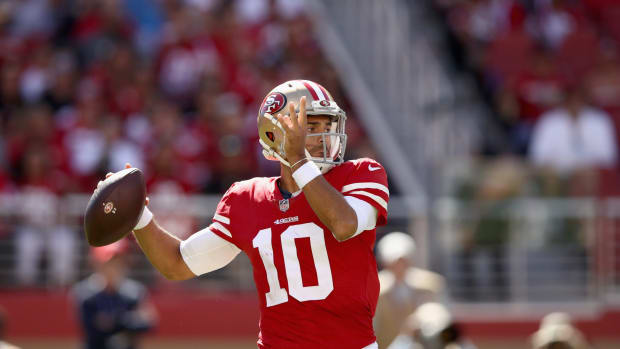 San Francisco 49ers QB Jimmy Garoppolo dropping back for a pass.