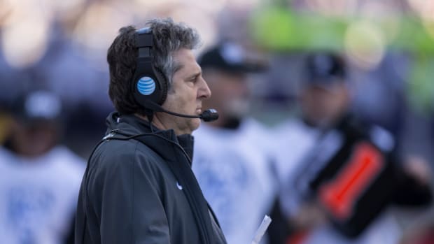 Mike Leach watches on during a game.