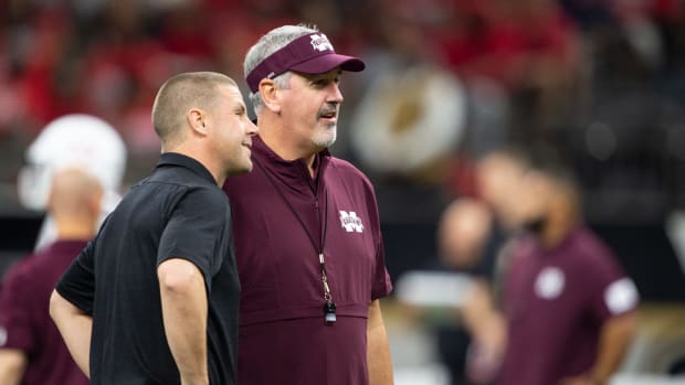 Louisiana's Billy Napier with Joe Moorhead ahead of a game against Mississippi State.