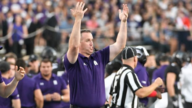 Northwestern coach Pat Fitzgerald reacting during a game.