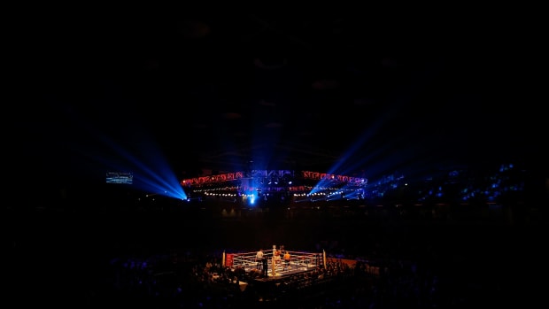 A wide shot of a boxing ring in England.
