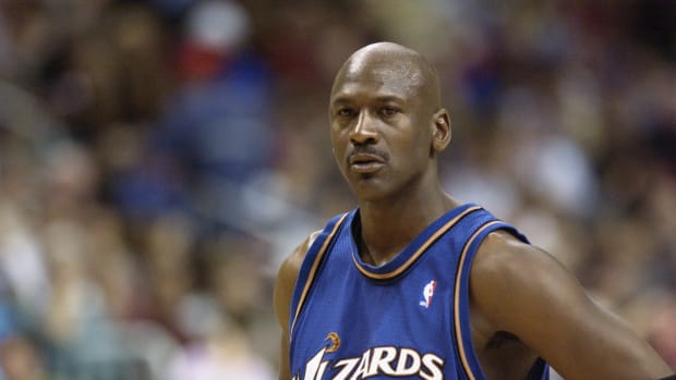 A closeup of Michael Jordan on the court during a Washington Wizards game.