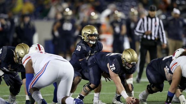 Malcolm Perry under center for the Navy Midshipmen.