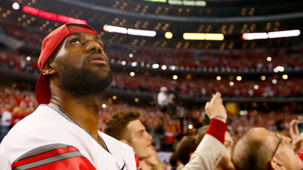 LeBron James roots on Ohio State in the championship game.