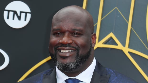 Shaquille O'Neal walks the red carpet.