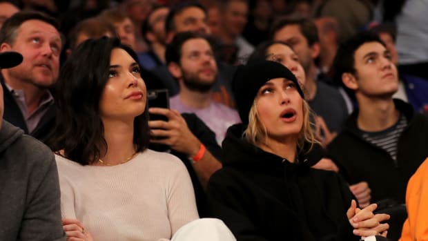 Kendall Jenner and Hailey Baldwin attending an NBA game.