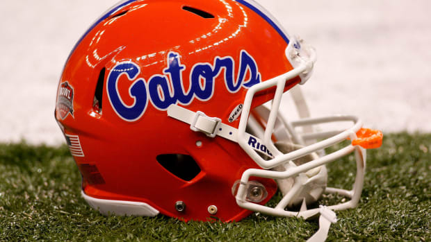 A closeup of a University of Florida football helmet.