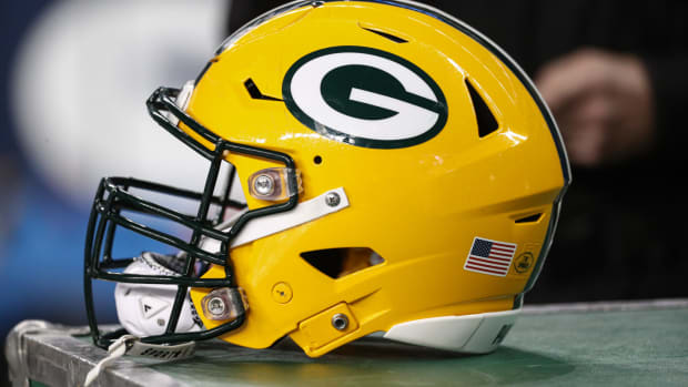 A closeup of a Green Bay Packers football helmet.