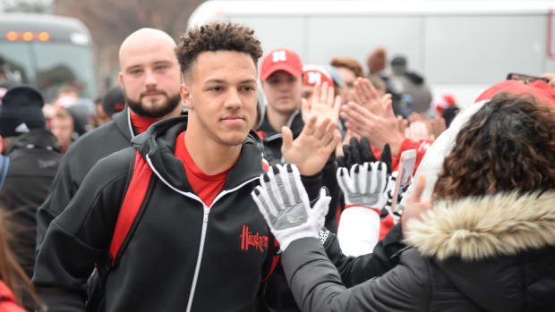 Adrian Martinez and the Nebraska Cornhuskers being greeted by fans.