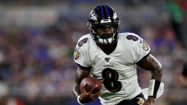 Lamar Jackson scrambles in preseason game for Ravens.
