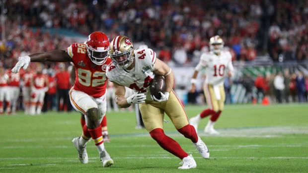 San Francisco 49ers Kyle Juszczyk moves the ball against the Kansas City Chiefs in Super Bowl LIV.