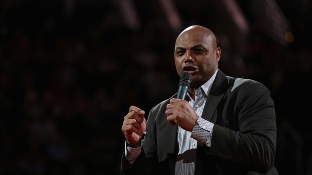 Charles Barkley speaking during halftime of an NBA game.