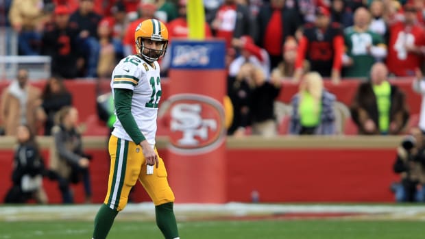 Aaron Rodgers walks off the field in San Francisco during NFC Championship Game.