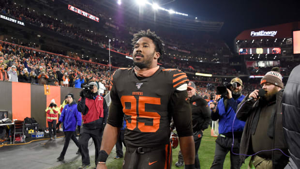 Cleveland Browns defensive end Myles Garrett walks off the field after getting ejected from game against the Steelers in 2019.