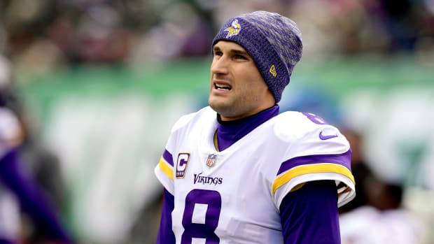 Minnesota Vikings quarterback kirk cousins warms up before a game in new york
