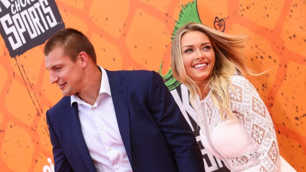 Rob Gronkowski and his girlfriend Camille Kostek walk the red carpet.
