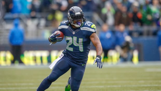 Marshawn Lynch running the ball for the Seattle Seahawks.
