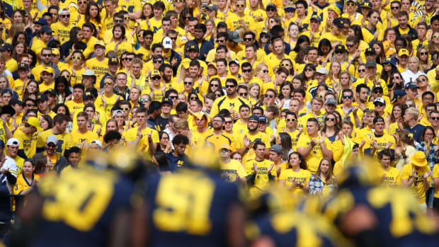 A view of the Michigan Wolverines student section during a football game.