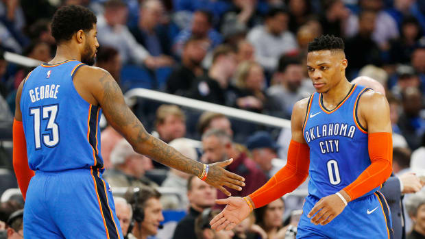 Oklahoma City Thunder stars Russell Westbrook and Paul George celebrate a win.