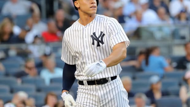Aaron Judge hits a ball for the Yankees.