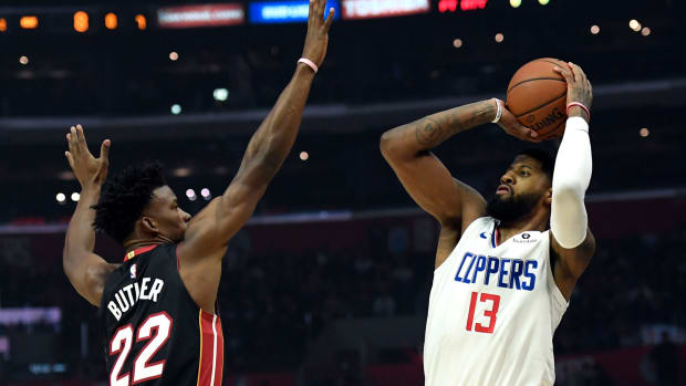 Los Angeles Clippers star Paul George pulls up against Jimmy Butler.