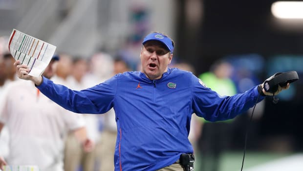 Florida football head coach Dan Mullen reacts during the Peach Bowl.