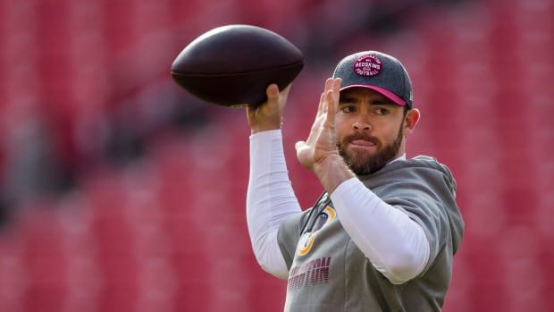 Colt McCoy throws a pass in warmups for the Redskins.