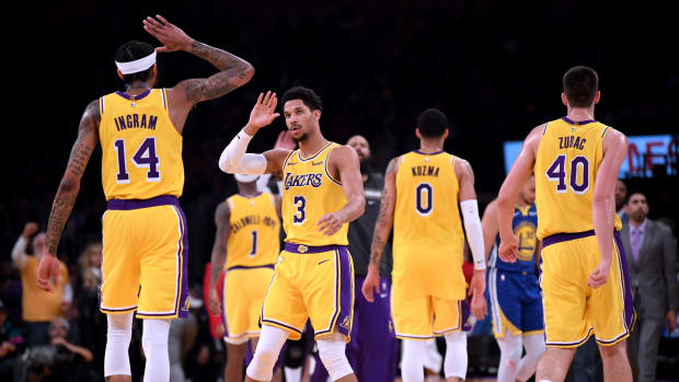 Brandon Ingram and Josh Hart high five during Lakers vs. Warriors.