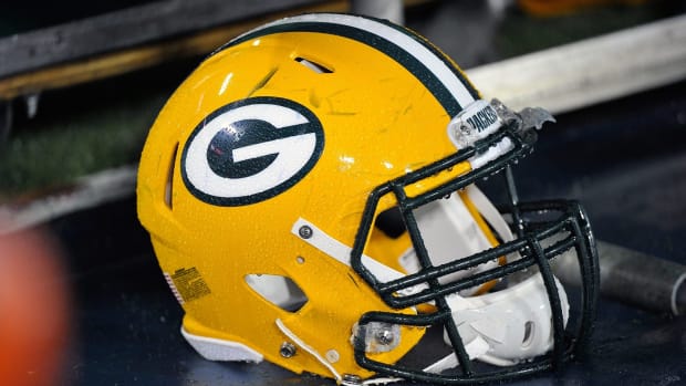 A closeup of a Green Bay Packers helmet.