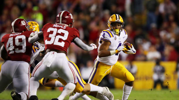Nick Brossette running the football against Alabama and Dylan Moses during SEC rivalry game.