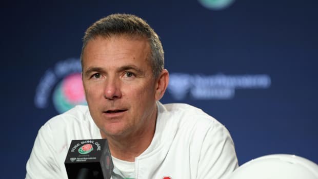 A closeup of Urban Meyer talking to the media at the Rose Bowl.