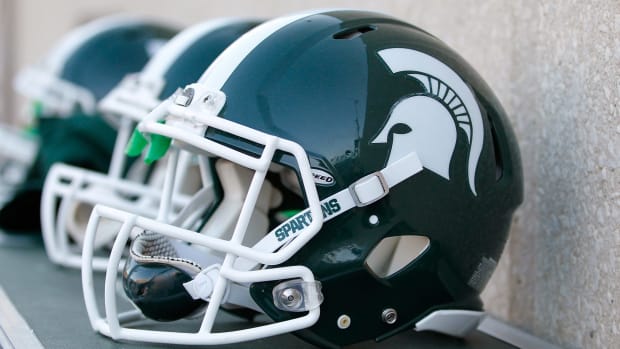 A closeup of a Michigan State football helmet.
