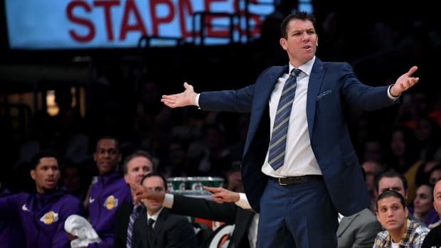 Lakers head coach Luke Walton upset with a call during a game.
