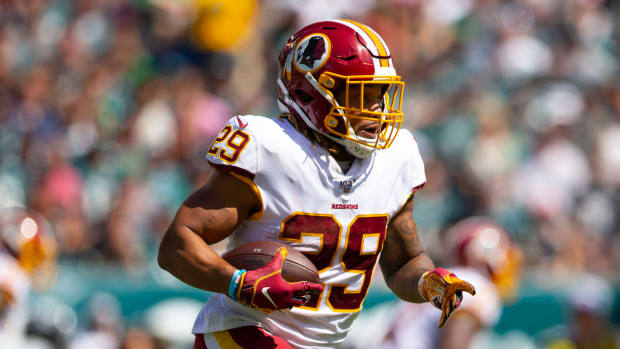 Derrius Guice runs the football for the Washington Redskins.