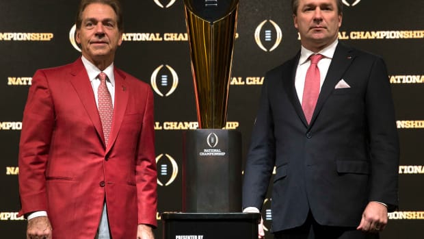 SEC coaches Nick Saban and Kirby Smart, with the College Football Playoff trophy.