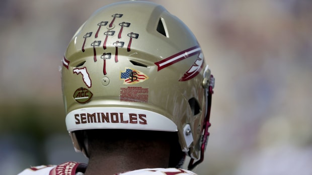 A view of the back of a Florida State football helmet.