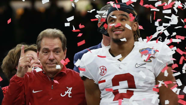 Jalen Hurts of the Alabama Crimson Tide and head coach Nick Saban celebrate thier win after the AllState Sugar Bowl against the Clemson Tigers.