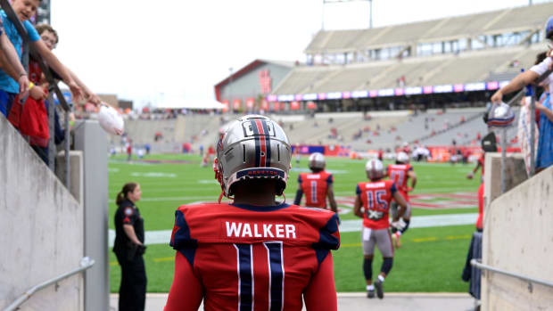 PJ Walker of the Houston Roughnecks takes the field.