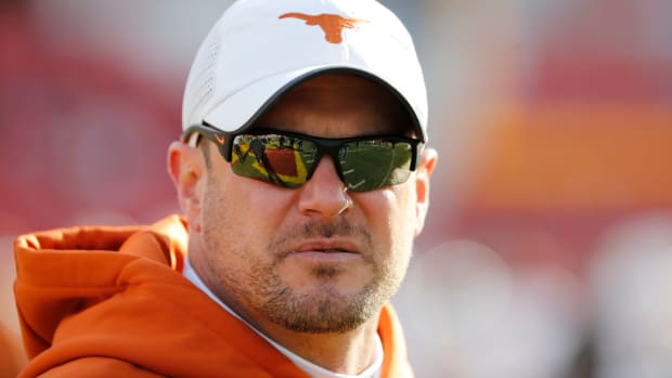 Tom Herman on the sideline during Texas' game against Iowa State
