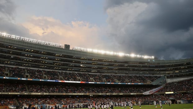 A picture of cloudy sky at an NFL game.