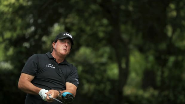 Phil Mickelson after hitting a golf ball.