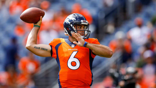 chad kelly warms up for the denver broncos. He was Mr. Irrelevant in the 2017 NFL Draft.