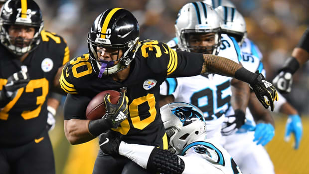 James Conner running the football against the Panthers.