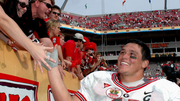 David Pollack shaking hands with Georgia football fans.