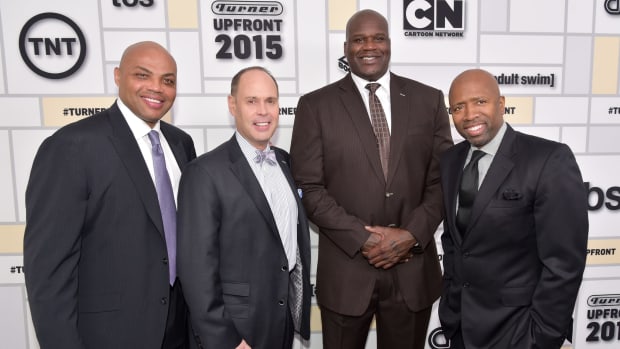The TNT crew featuring Charles Barkley, Ernie Johnson, Shaquille O'Neal, and Kenny Smith at an event.